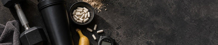 Protein and training supplements on a counter